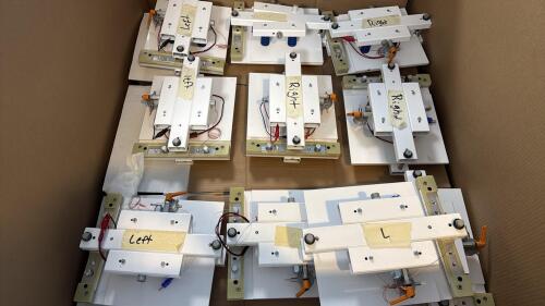 Fixed pressure cell compression test fixtures.