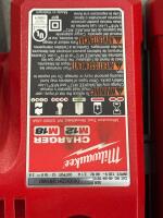 (1) Milwaukee 1/4&rdquo; Square Ring Impact Wrench And (1) Milwaukee 1/2&rdquo; Drill Driver(2) Milwaukee M18 Battery Chargers - 7