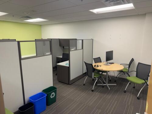 (4) cubicles and round table