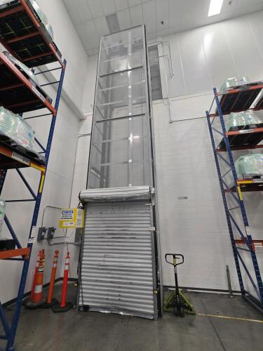Custom Industrial Products Inc. Freight Lifting Vertical Reciprocating Conveyor