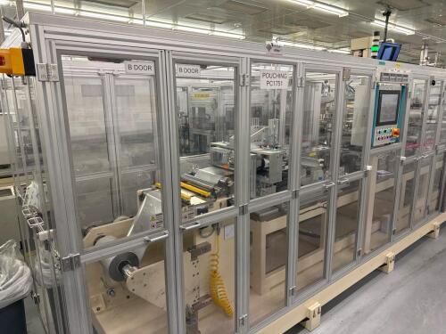 Battery cell pouching assembly