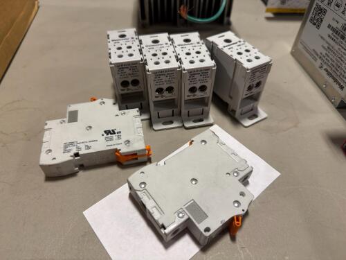 (4) Weidmuller Power Distribution Block, & (2) Weidmuller supplementary protector (circuit breaker)
