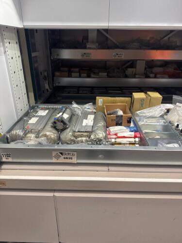 Divider of Tray 2007 - Guide cylinders, air cylinders, vacuum pumps, vacuum filters, air valve solenoids and conveyor switches
