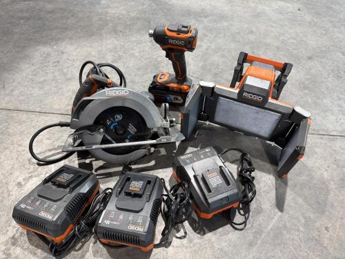 RIDGID 18V SubCompact Brushless Cordless 6-1/2 in. Circular Saw, AND Ridgid 18V Brushless Impact Driver, AND Ridgid 18V Hybrid Folding Panel Light, AND (3) 18V RIDGID Battery Chargers