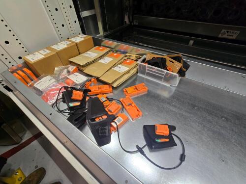 Divider Tray of 1012- Assorted Lot of Hand Straps, Barcode Scanners, Progloves, Transmitters, Charging Stations