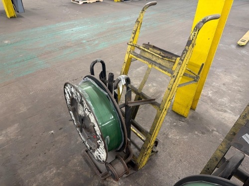 Heavy-duty industrial wire reel cart with roll of polyester (PET) strapping band