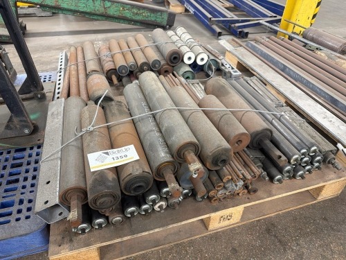 Pallet of used industrial conveyor rollers and metal components