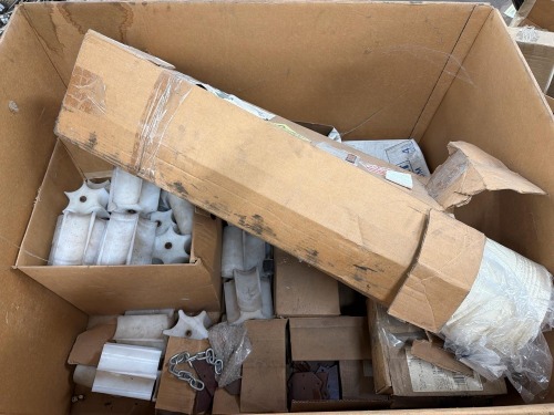 Heavy-duty fiberglass fabric roll, assortment of plastic sprocket or gear components, & trolley assembly parts