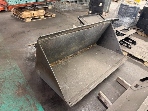 Skid steer bucket attachment