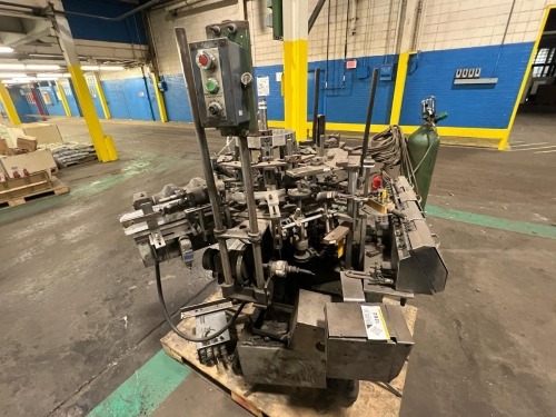 Owens-Illinois Rotary Glass Bottle Handling / Inspection Machine with Auger Feed, Triple Check Detectors, and Gaging System on Casters