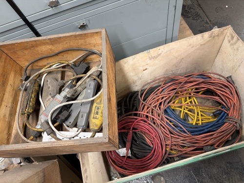 Assortment of electrical cords and surge protectors