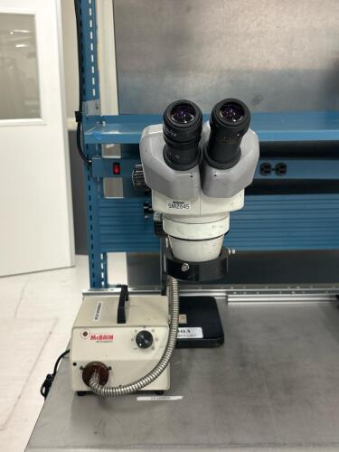 Nikon SMZ645 Stereo Zoom Microscope, 10x Eyepieces, McBain FOI-150 Light Source, Boom Stand