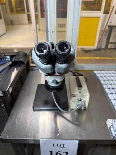 Nikon SMZ645 Stereo Zoom Microscope with 10x Eyepieces, Boom Stand, and Fiber Optic Illuminator