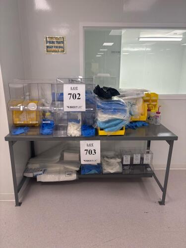 (LOT) Assorted Disposables includes TechNiGlove TN2000 Series nitrile gloves (various sizes), cleanroom gowns, lab coats, face masks, hoods, squeeze wash bottles, and multiple clear acrylic and yellow plastic storage bins. Ideal for controlled environment