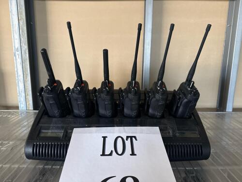 (6) MOTOROLA R7 RADIO WITH MOTOROLA 6 BAY MULTI CHARGING STATION (LOCATION: BACKROOM GIGAFACTORY)