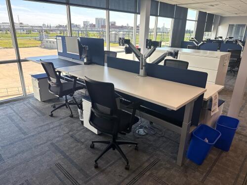4 PERSON WORKSTATION HERMAN MILLER NEVI SIT TO STAND ELECTRIC ADJUSTABLE DESK 70&rdquo; x 28&rdquo; x 27&rdquo; (46&rdquo; MAX HIGHT) W/ (4) OFFICE CHAIRS, (4) MOBILE PEDESTALS AND MONITOR MOUNTS <br/>(2ND FLOOR OFFICE, STAIRS ONLY, IN GIGAFACTORY)