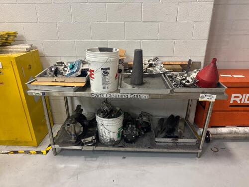 Stainless steel work bench and contents