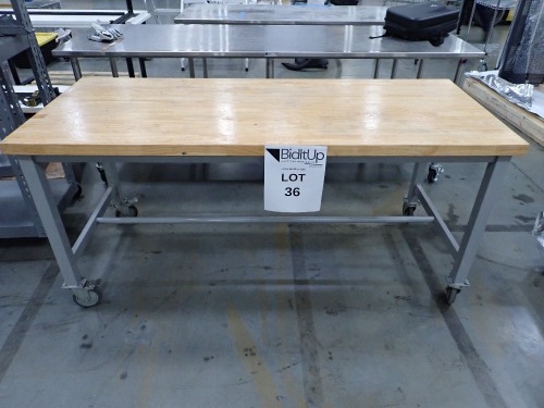 ROLLING WOOD TOP WORK TABLE 72x30x34in