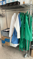 LOT OF (3) RACKS OF ASSORTED LABORATORY EQUIPMEMT, TO INCLUDE: SAFETY GLASSES, COTTON TIPPED APPLICATORS, LAB COATS, ASSORTED BEAKERS, ETC. - 6