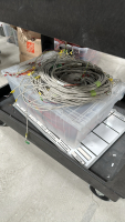 LOT OF ASSTD CABLES AND PARTS FOR NEWWARE BATTERY TESTING SYSTEMS WITH (2) CARTS AND BINS - 8