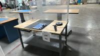 STEEL FRAME WOOD TOP WORKBENCH W/ ULINE MOUNTED ACRYLIC CONTAINER, MOUNTABLE MAGNIFIER, CARL RT-200 ROTARY PAPER TRIMMER, ETC., DIMENSIONS: 60" x 34" x 64"