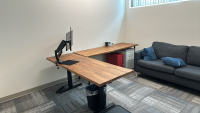 OFFICE (2) ASSORTED WOOD TOP OFFICE TABLES (74" x 25.5" x 29"), (2) SPECTRE MOUNTED 28" MONITORS, (3) ASSORTED COUCHES/LOUNGE CHAIRS, ETC.
