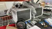 METAL RACK OF ASSORTED ITEMS TO INCLUDE: ASSORTED ALUMINUM FIXTURES, FANS, BRACKETS, HOSING, ADHESIVE STRIPS, ETC., DIMENSIONS: 112" x 48" x 96" - 3
