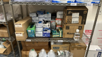 WIRE RACK WITH ASSORTED ITEMS TO INCLUDE: SCOTT MULTI-PURPOSE CLOTHS, ULINE SHOE COVERS, ULINE SHOP TOWELS, ULINE NITRILE GLOVES, ULINE RECLOSABLE BAGS, ULINE TRASH LINERS, ETC. - 4