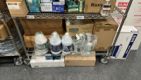 WIRE RACK WITH ASSORTED ITEMS TO INCLUDE: SCOTT MULTI-PURPOSE CLOTHS, ULINE SHOE COVERS, ULINE SHOP TOWELS, ULINE NITRILE GLOVES, ULINE RECLOSABLE BAGS, ULINE TRASH LINERS, ETC. - 5