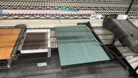 WIRE RACK WITH ASSORTED ITEMS TO INCLUDE: ULINE VINYL SAFETY TAPE, SCOTCH PAD, IMPULSE SEALER, PAPER CUTTER, HEATER, FOLDING CHAIRS, ETC. - 3