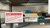WIRE RACK WITH ASSORTED ITEMS TO INCLUDE: ULINE VINYL SAFETY TAPE, SCOTCH PAD, IMPULSE SEALER, PAPER CUTTER, HEATER, FOLDING CHAIRS, ETC. - 5