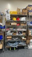 WIRE RACK WITH ASSORTED ITEMS TO INCLUDE: ULINE BIONIC FACE SHIELD, SCREWS, DUSTER, TUBING, EYE WASH FLUID, ETC.