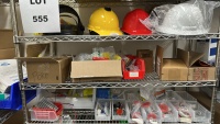 WIRE RACK WITH ASSORTED ITEMS TO INCLUDE: ULINE BIONIC FACE SHIELD, SCREWS, DUSTER, TUBING, EYE WASH FLUID, ETC. - 3