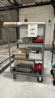RACK WITH ASSORTED ITEMS TO INCLUDE: ASSORTED SPARE FICTURES, POWER SUPPLY, SPRINGS, VALVES, ETC.