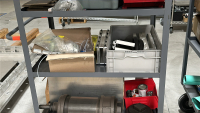 RACK WITH ASSORTED ITEMS TO INCLUDE: ASSORTED SPARE FICTURES, POWER SUPPLY, SPRINGS, VALVES, ETC. - 3