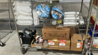 WIRE RACK WITH ASSORTED ITEMS TO INCLUDE: ALUMINUM FLASKS OF ASSORTED SIZES, 15mL CONICAL CENTRIFUGE TUBES, THUNDER70 CLEANING WIPES, ULINE MATS, ETC. - 2