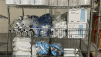 WIRE RACK WITH ASSORTED ITEMS TO INCLUDE: ALUMINUM FLASKS OF ASSORTED SIZES, 15mL CONICAL CENTRIFUGE TUBES, THUNDER70 CLEANING WIPES, ULINE MATS, ETC. - 3
