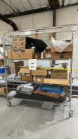 WIRE RACK WITH ASSORTED ITEMS TO INCLUDE: ZEUS 50' TUBING, ULINE HEAVY UNIVERSAL PADS, WB JONES SPRINGS, WASHERS, SILVER SHIELD GLOVES, ETC.