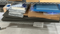 WIRE RACK WITH ASSORTED ITEMS TO INCLUDE: ZEUS 50' TUBING, ULINE HEAVY UNIVERSAL PADS, WB JONES SPRINGS, WASHERS, SILVER SHIELD GLOVES, ETC. - 2