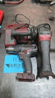 A Milwaukee Cordless Drill and A Milwaukee 2780-20 Grinder.