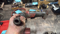 A Milwaukee Cordless Drill and A Milwaukee 2780-20 Grinder. - 5