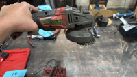 A Milwaukee Cordless Drill and A Milwaukee 2780-20 Grinder. - 7