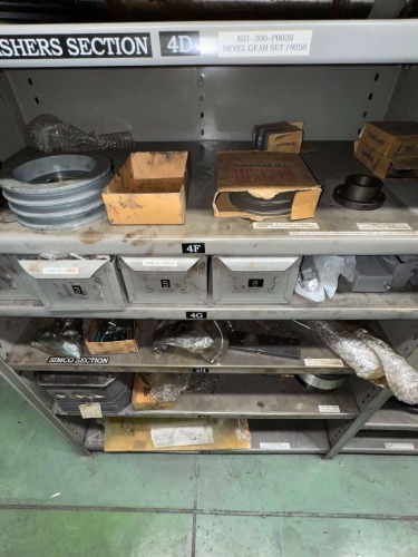 LOT 9 SHELVES OF ASSORTED CONTROL BOXES, AIR CYLINDERS, GEAR SHAFTS, PULLEY&rsquo;S, DRUM SHAFTS ETC.