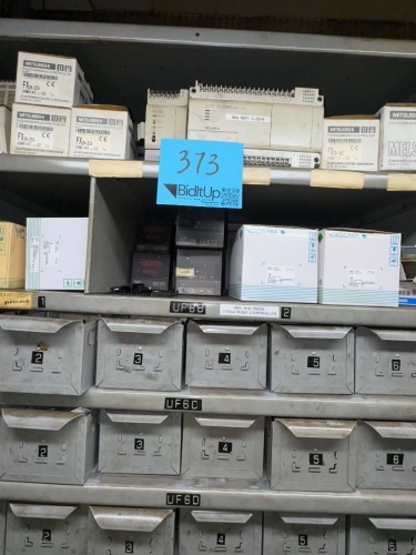 LOT 9 SHELVES OF ASSORTED CONTROLLERS, LIMIT SWITCHES, PUSH/PULL OPERATORS, CAM SWITCHES, DOOR LOCK SWITCHES AND MOTORS