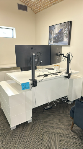 LOT OF ASSTD OFFICE FURNITURE: ADJUSTABLE HEIGHT DESK APPROX: 63&rdquo; x 31&rdquo; WITH (2) SIDE CABINETS, (1) CABINET APPROX: 62&rdquo; x 18&rdquo; x 30&rdquo; WITH OFFICE CHAIR, SIDE CHAIR AND COAT RACK<br/>(MONITORS NOT INCLUDED)