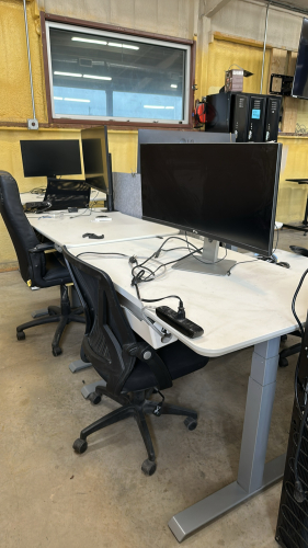 LOT OF (4) ADJUSTABLE HEIGHT DESKS APPROX: 47&rdquo; x 29&rdquo; WITH (4) ASSTD OFFICE CHAIRS & (3) ASSTD MONITORS