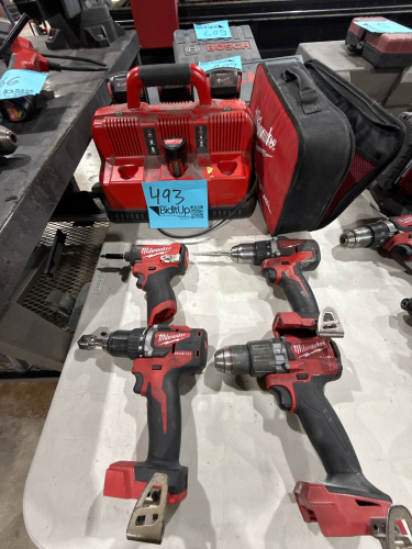 LOT OF (4) ASSTD MILWAUKEE DRILLS WITH MILWAUKEE (6) BATTERY CHARGER STATION