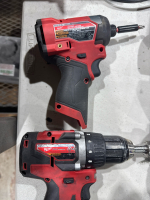 LOT OF (4) ASSTD MILWAUKEE DRILLS WITH MILWAUKEE (6) BATTERY CHARGER STATION - 4