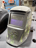 LOT OF (4) ASSTS WELDING HELMETS: MILLER QTOSZ87W3/8-13, MILLER DIGITAL ELITE OTOSZ87W3/8-13, MILLER CLASSICAL SERIES & KLUTCH: #48750/48751 & (1) WELDING GOGGLES MODEL:LY-100R - 3