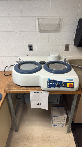 BUEGLER GRINDER POLISHER METASERV 250 MODEL: 49-10057 W/ BUEHLER ABRASIVE PAPER AND TABLE